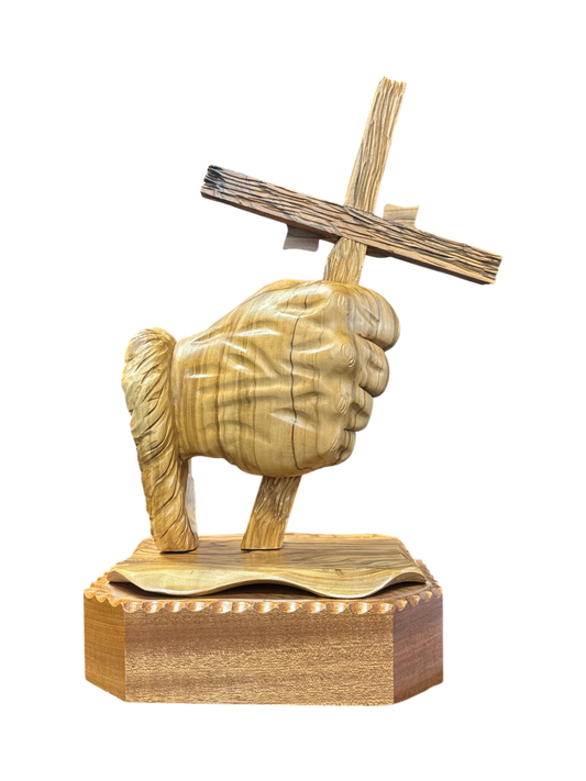 Hand holding Cross