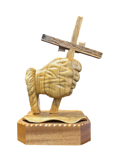Hand holding Cross